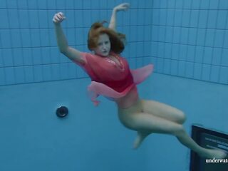 シルビー, a ユーロ ティーン, showcasing 彼女の 水泳 prowess